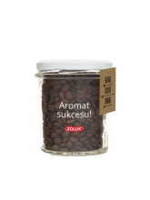 Zrnková káva ve sklenici