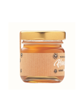 Sklenice s medem z divokých květů