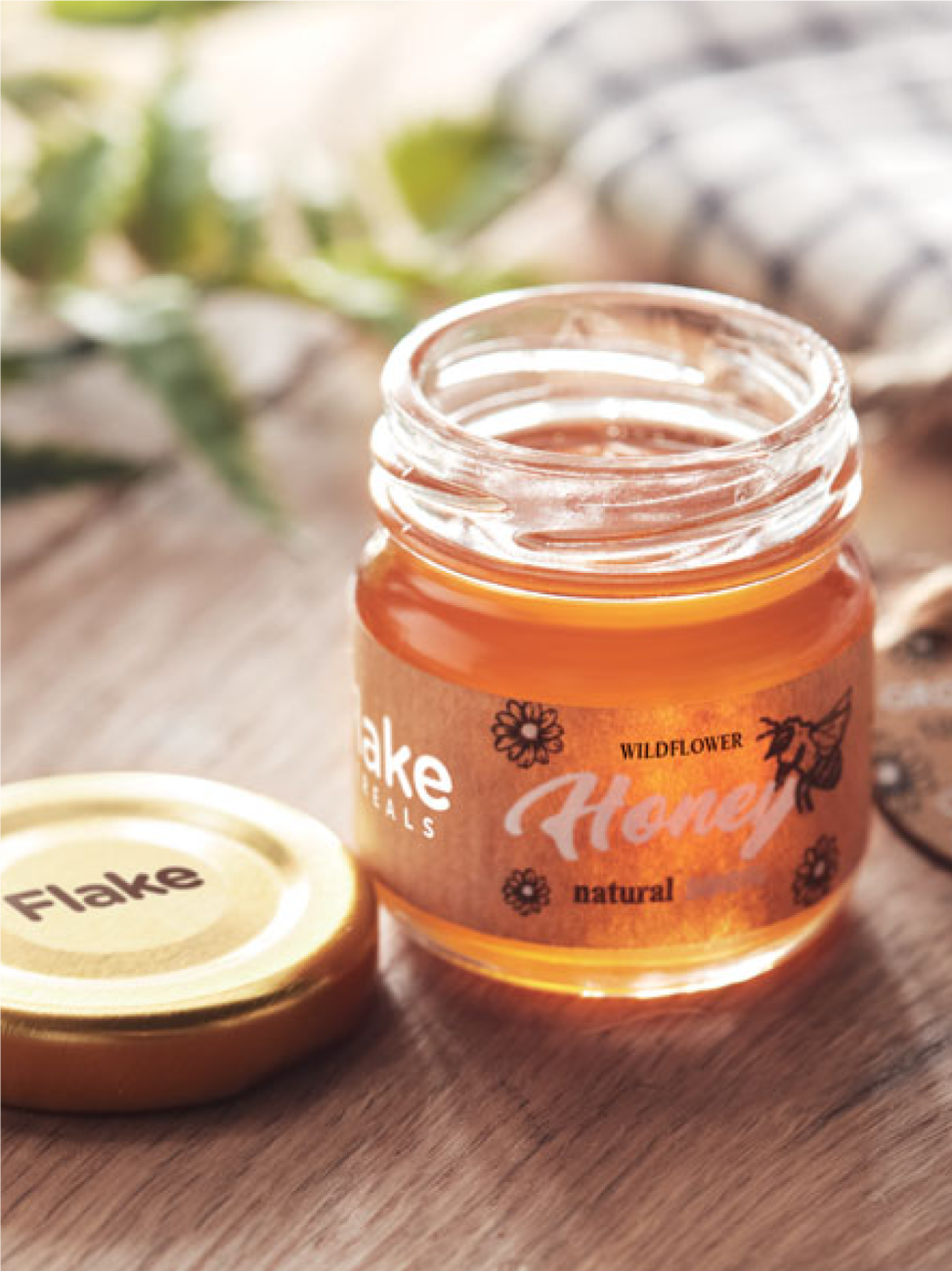 Sklenice s medem z divokých květů